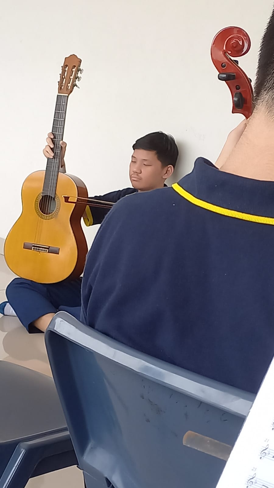 me holding a guitar (again)